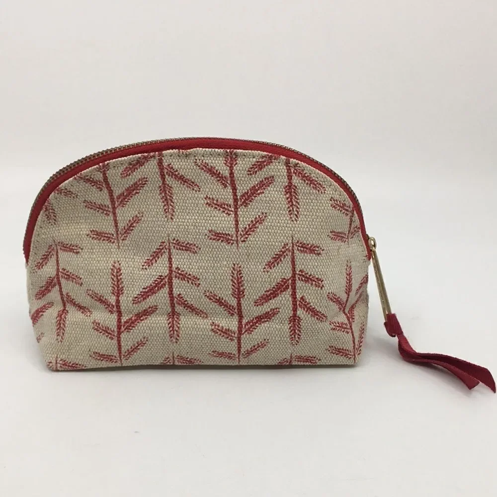 FEED 10 Clarins makeup cosmetics light tan and red carry-all pouch